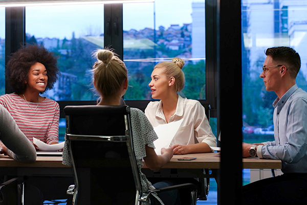 young people at boardroom table